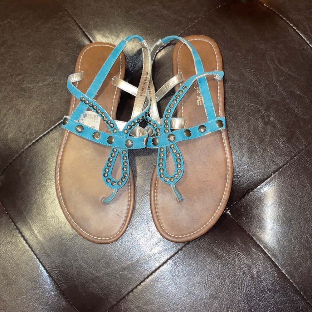 Turquoise sandals.